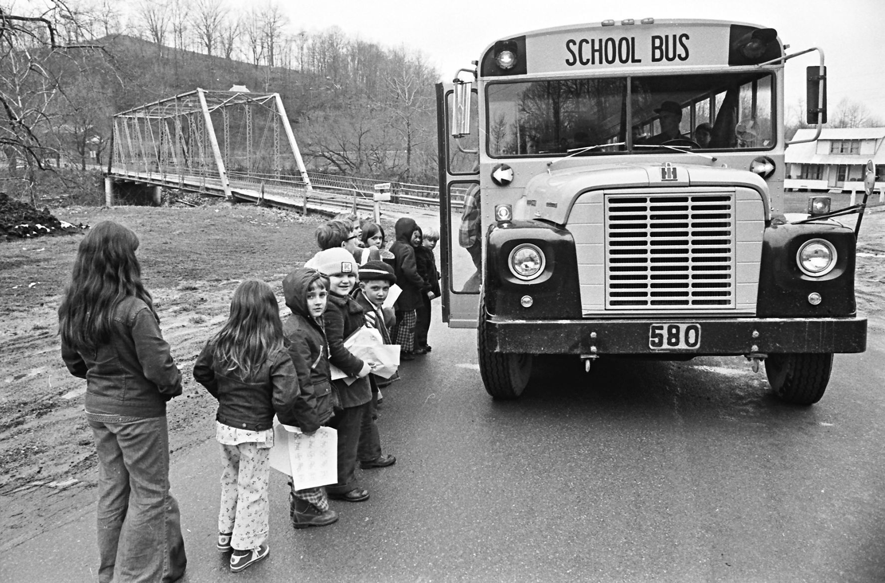 Vintage West Virginia: Bus waits at bridge